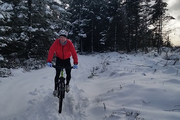 Cheshire CAT cyclists Mountain Biking in the snow at Llandegla